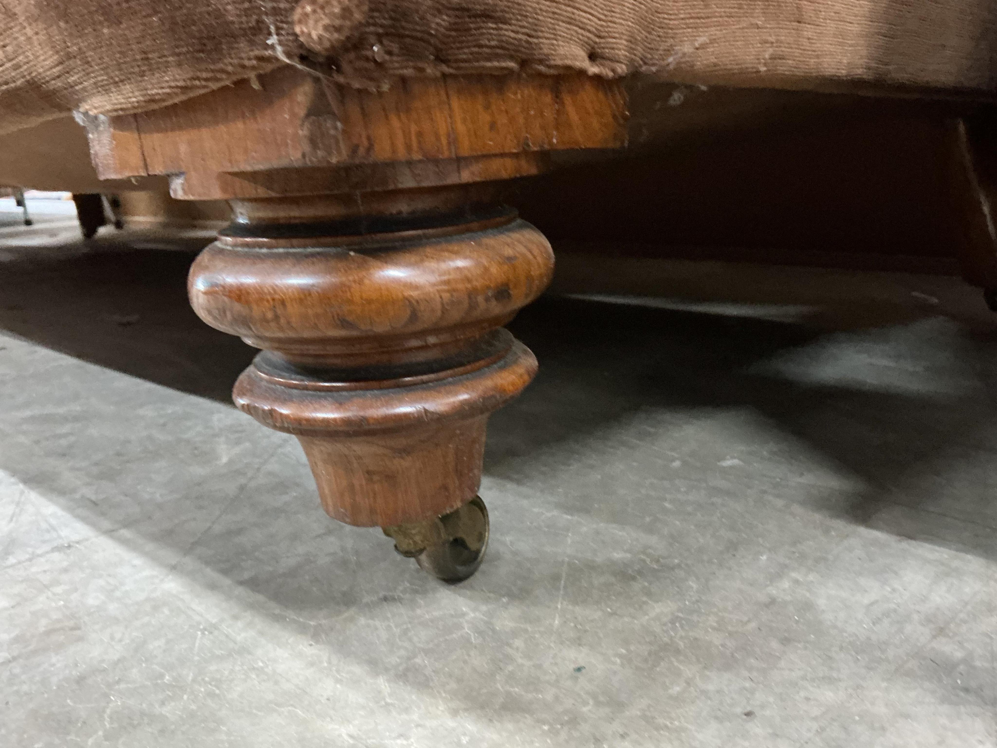 A Victorian upholstered Chesterfield settee, width 206cm, depth 82cm, height 66cm